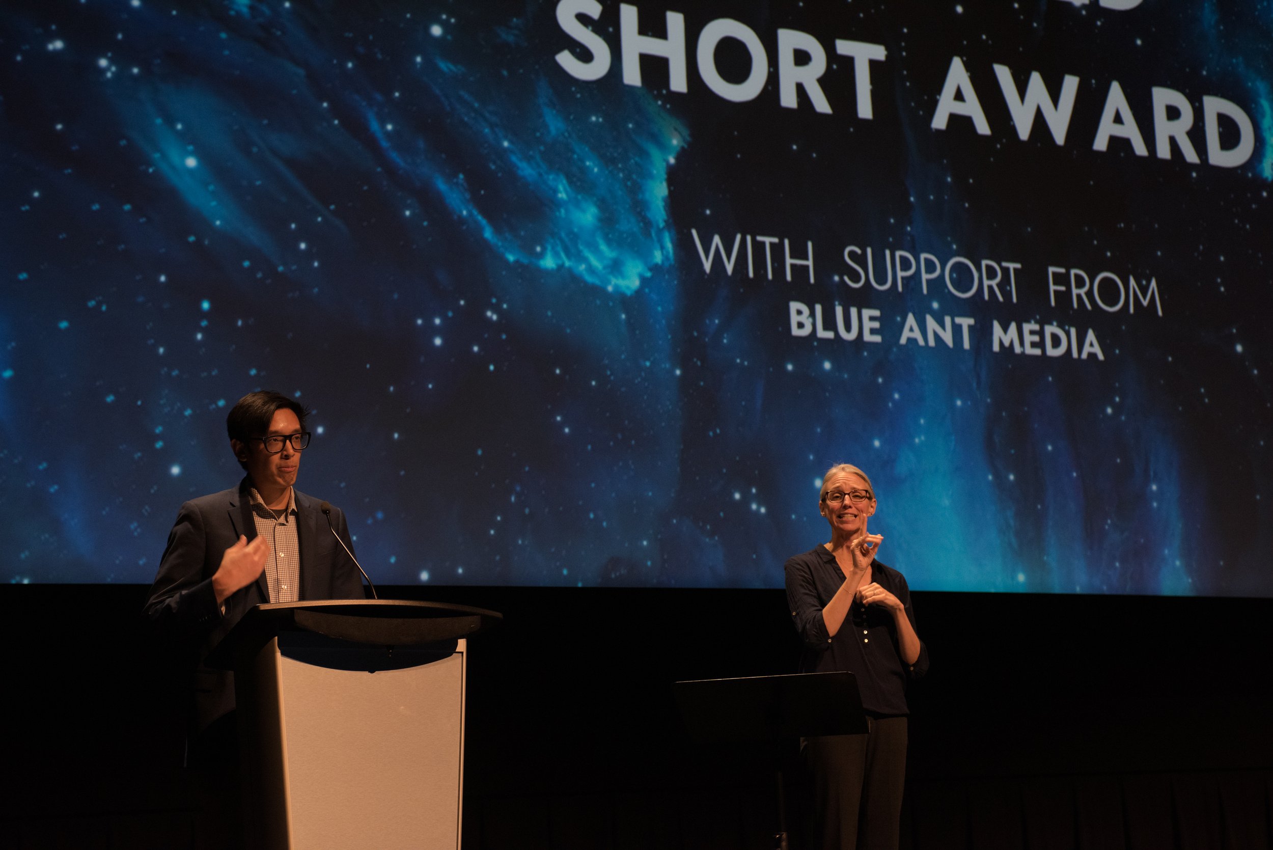 David Morrison, Associate Director at imagineNATIVE, presenting the Animated Short Award. Image by Pengkuei Ben Huang.