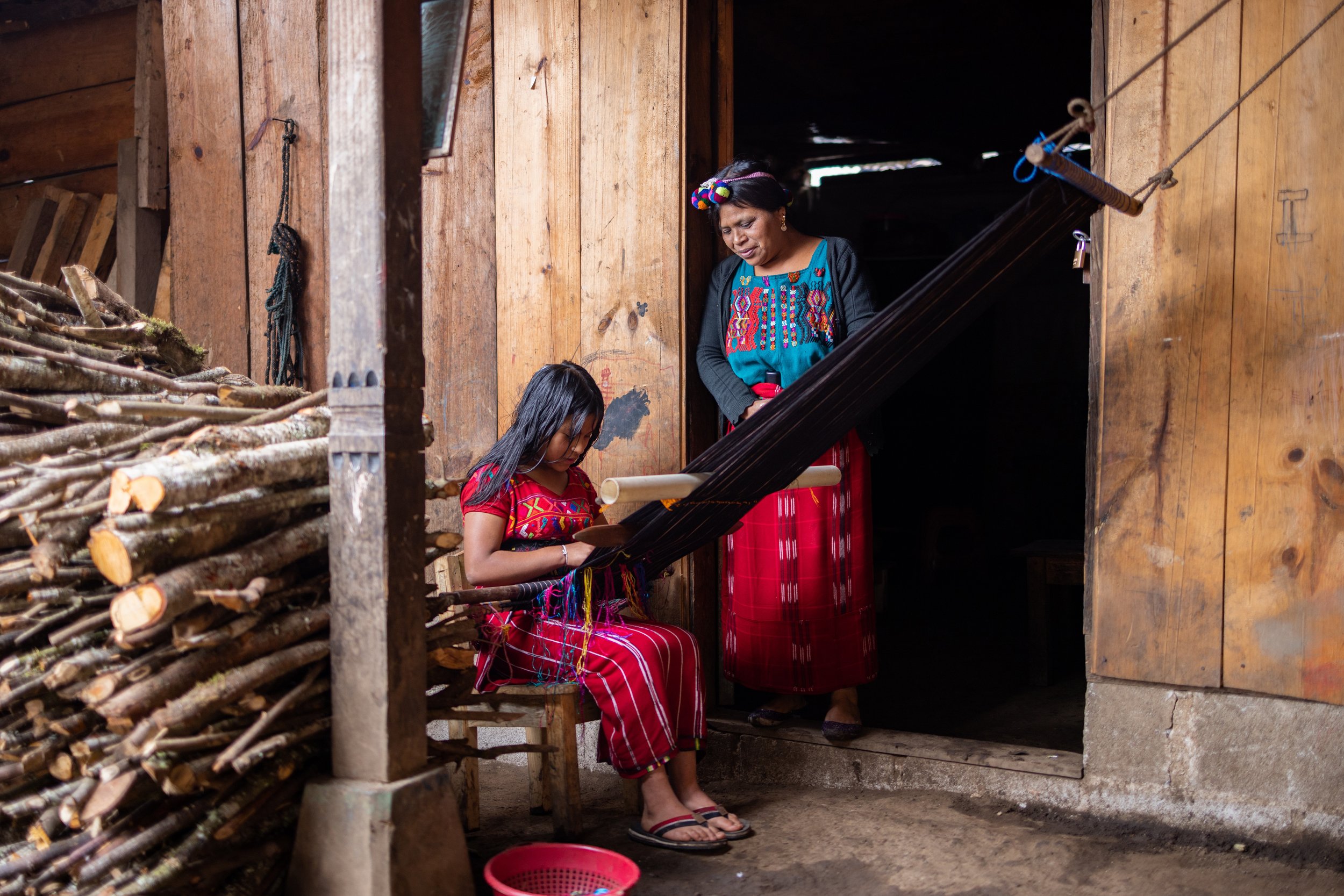 María Ermelinda, a student in Colegio Horizontes’ inaugural class, works on her backstrap loom at home making a huipil. Most weavers spend over a month to make one huipil.