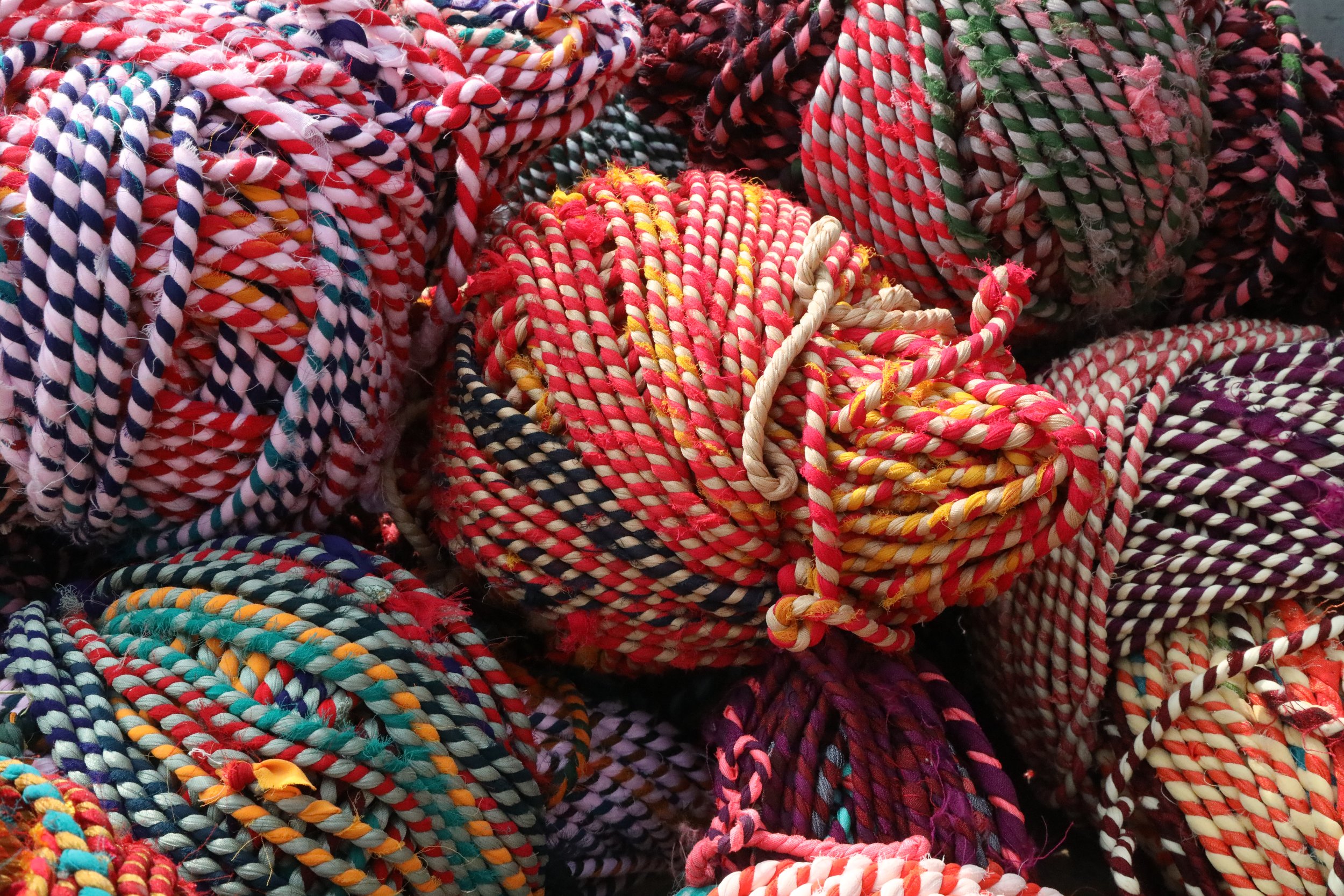 Pictured here are samples of the macramé rope that is made from cotton cords and used for weaving.