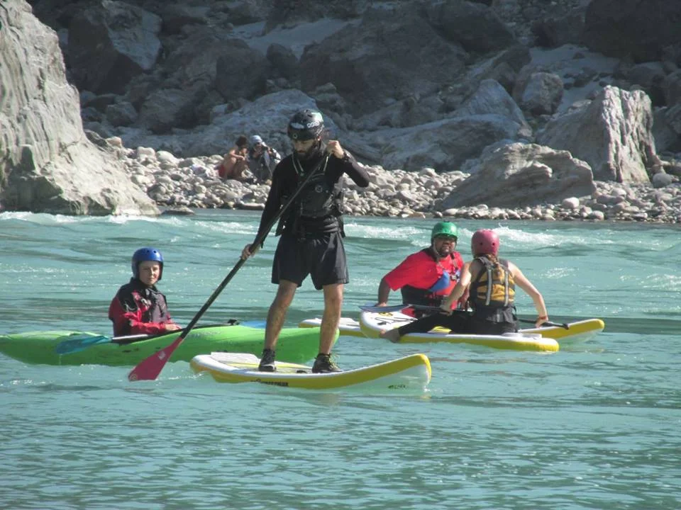 SUP_Helmet two kayaks out of focus.jpg
