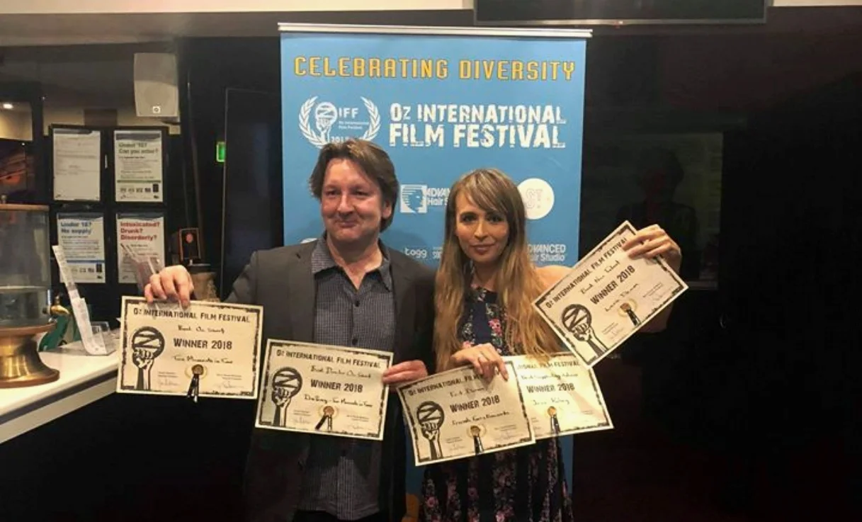 Indie filmmaker Donald Percy with his winning certificates and Lara Deam with the winning certificates for Friends, Foes & Fireworks