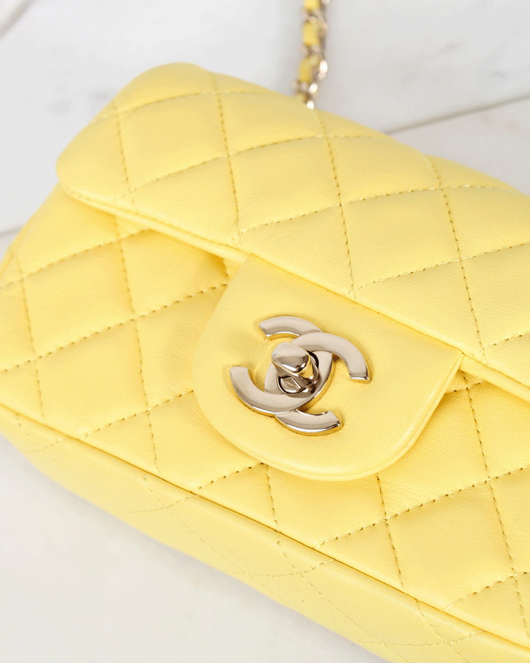 Chanel Yellow Lamb Mini Drawstring Bag – House of Carver