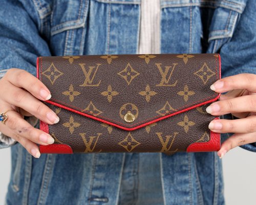 Louis Vuitton Sarah Wallet Monogram Brown in Coated Canvas with