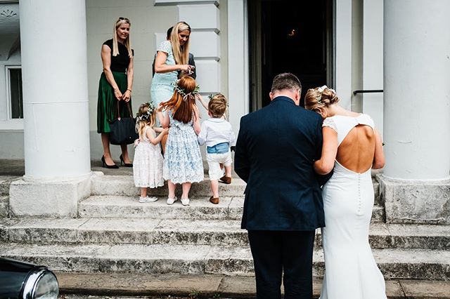 Wedding March
The difference between documenting and orchestrating is that you can capture naturally occurring moments. Even with their back to the camera, I like the tenderness and intimacy of the bride and father. It contrasts nicely with the sweet