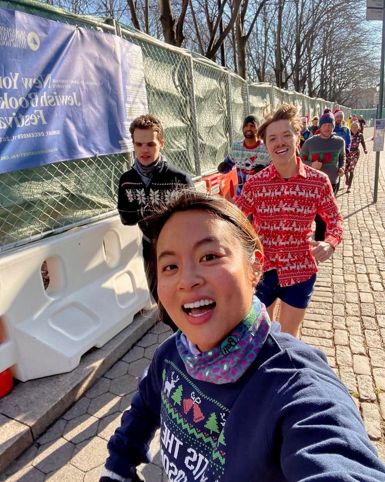 How does TMIRCE celebrate the holidays? By running in Christmas sweaters (and drinking in them too)!