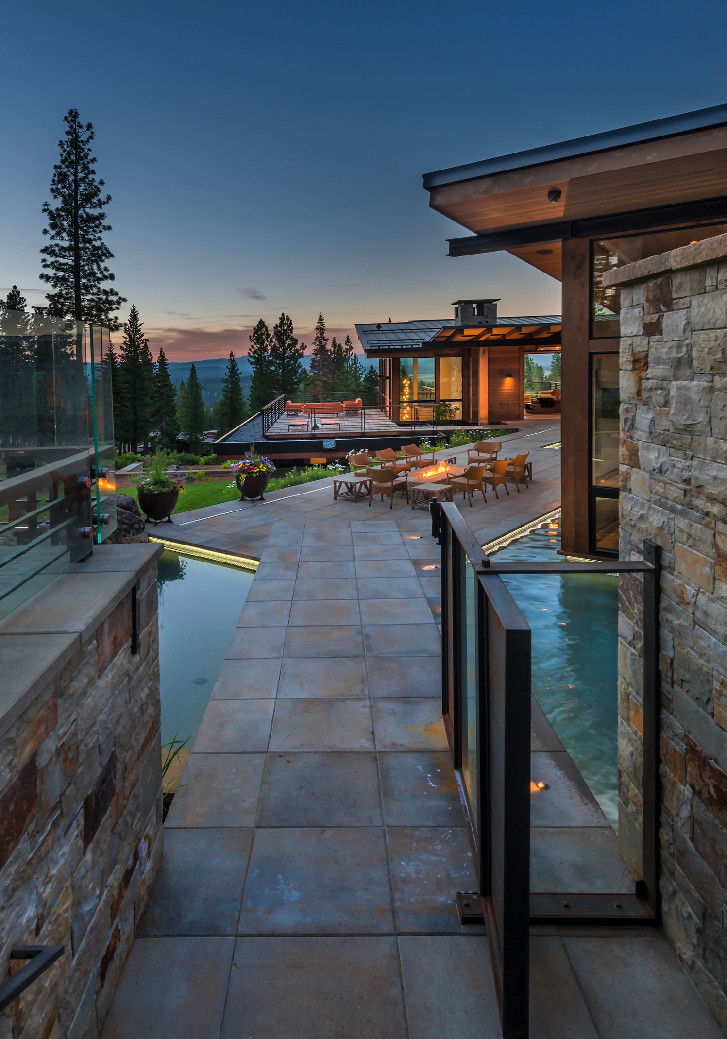 Lot 595_Exterior_Water Features_Concrete Pavers_Weiland Doors_Horizontal wood siding.jpg
