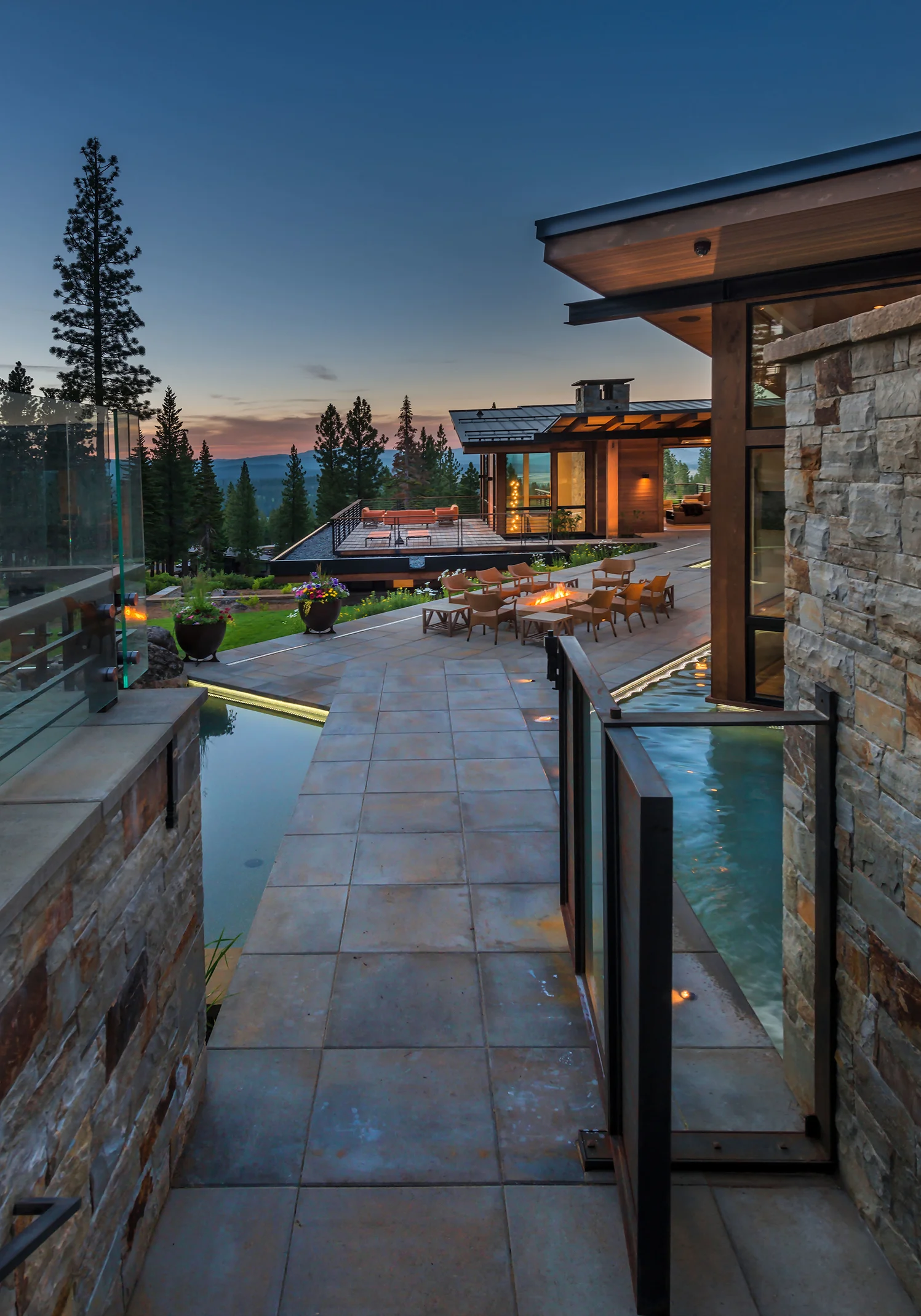 Lot 595_Exterior_Water Features_Glass Gate_Firepit_Landscaping_View.jpg