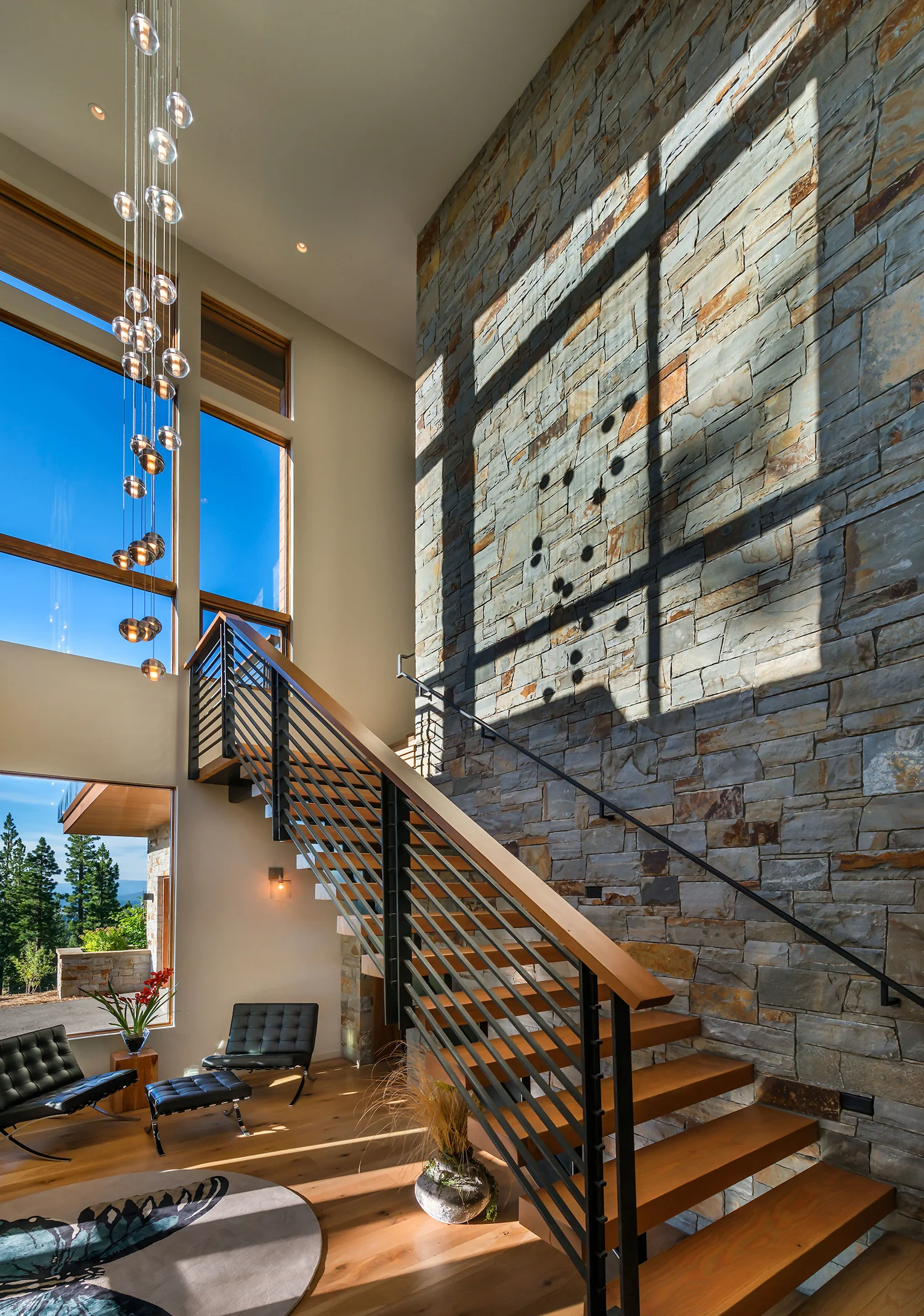 Lot 595_Stairwell_Int Masonry_Windows_Chandelier.jpg