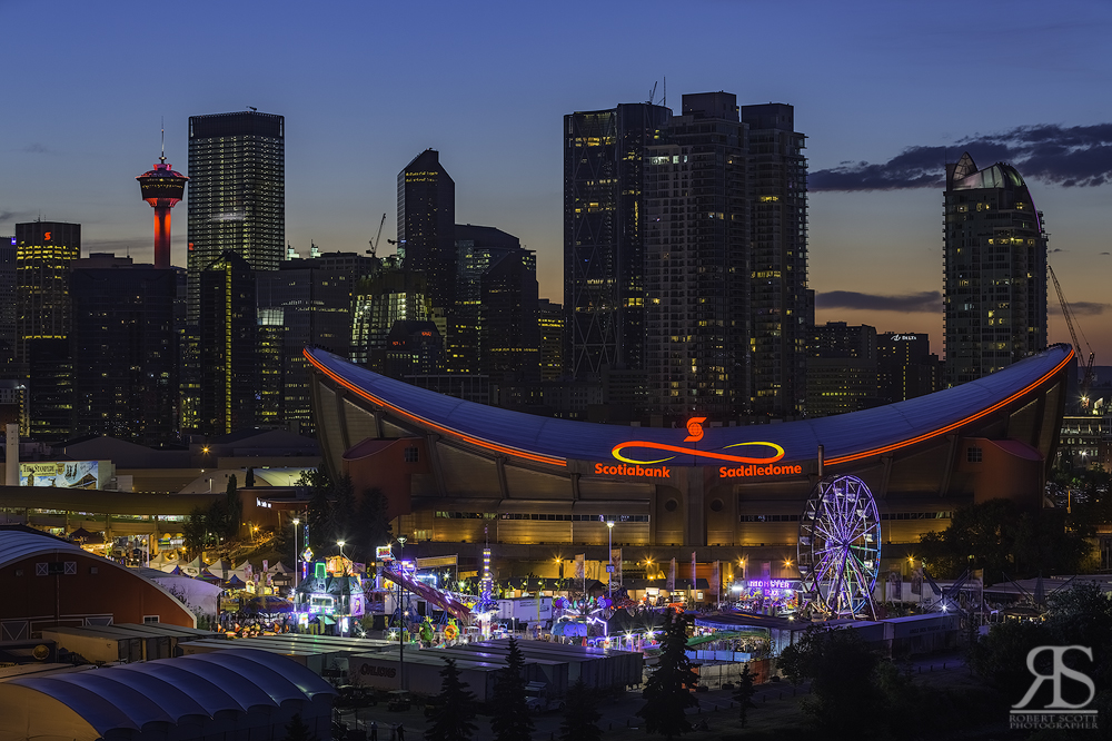 Don't leave after sunset. I like to capture the city lights at twilight.