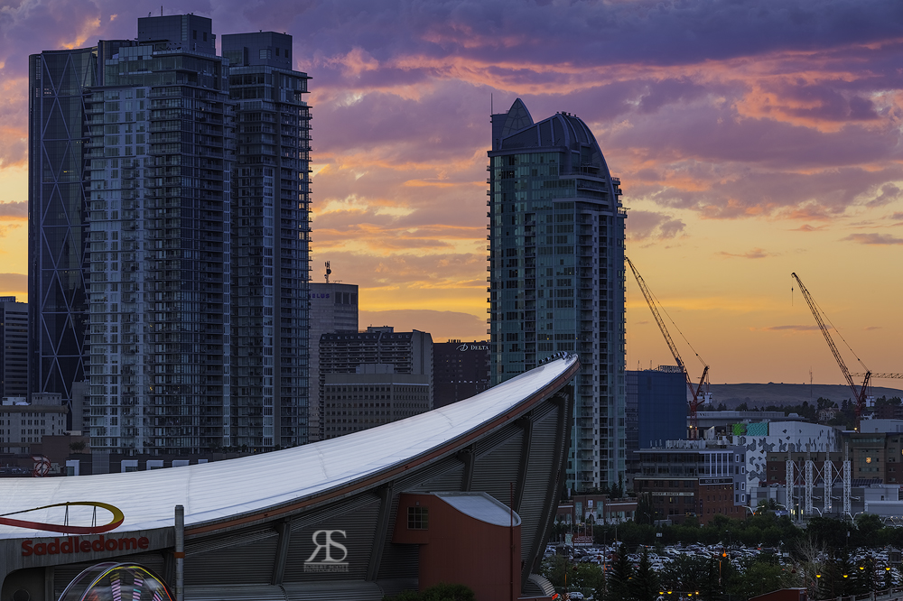 Bring your telephoto lens to capture the intricate details of the skyline.