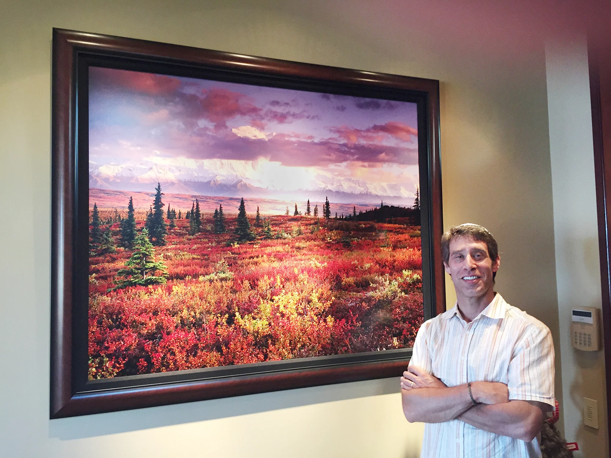 Jon Paul with a 40x50 inch (chromogenic) print on photographic paper in a collectors lakefront home.
