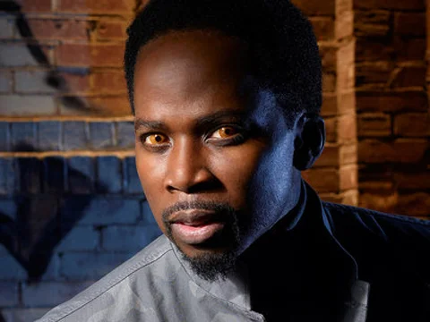 Harold wearing his contacts in the Television show Constantine