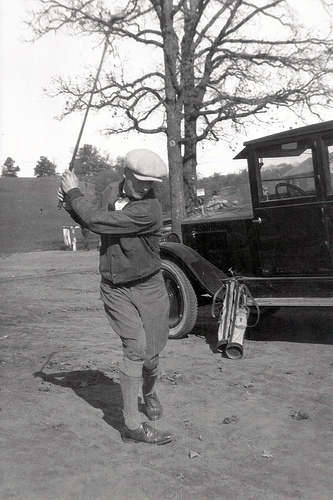 Warming_up_for_a_round_of_golf__Showboat_displaying_his_golf_togs__car_and_terrific_golf_swing.jpg