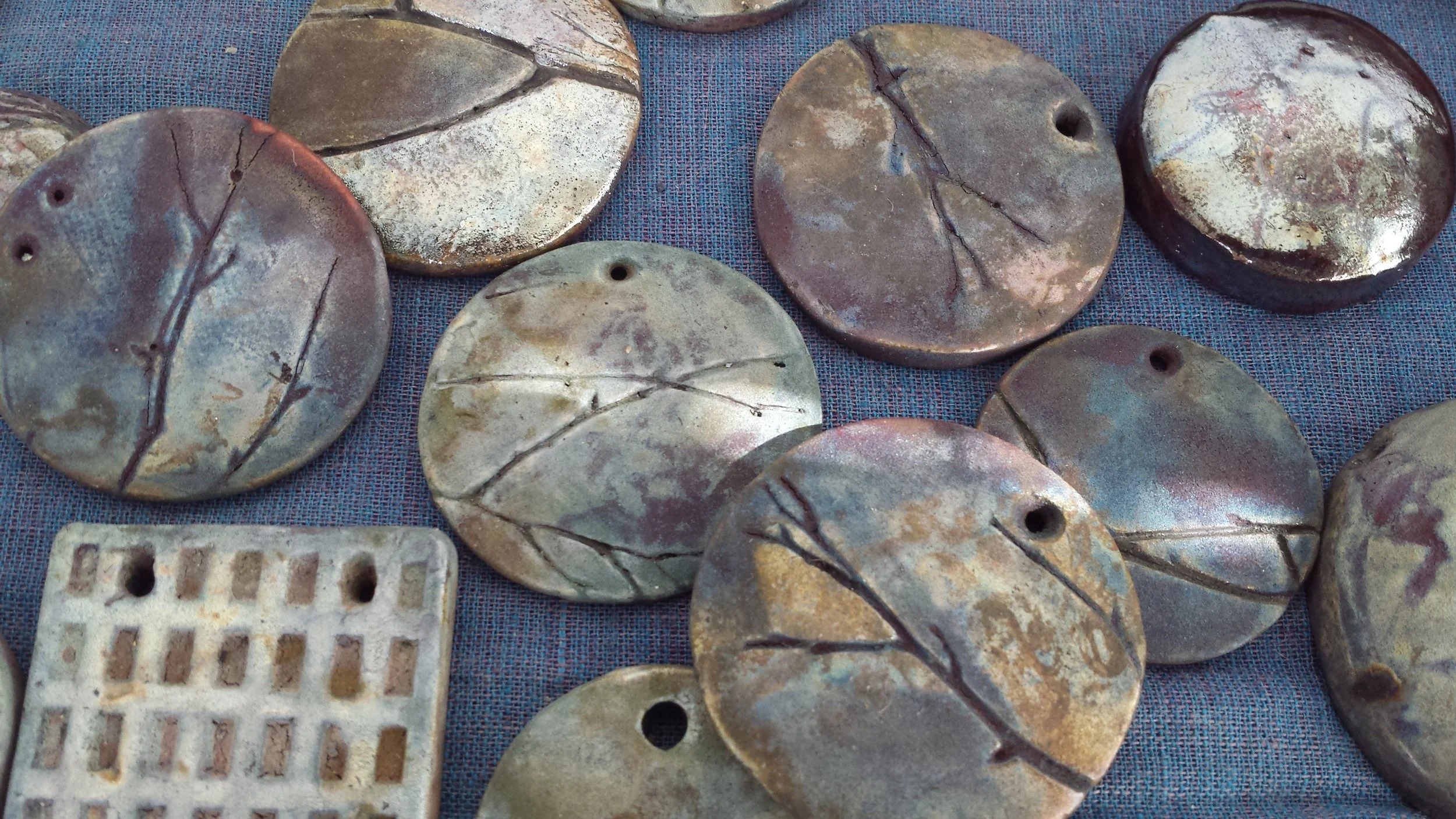 finished raku pieces ready to assemble