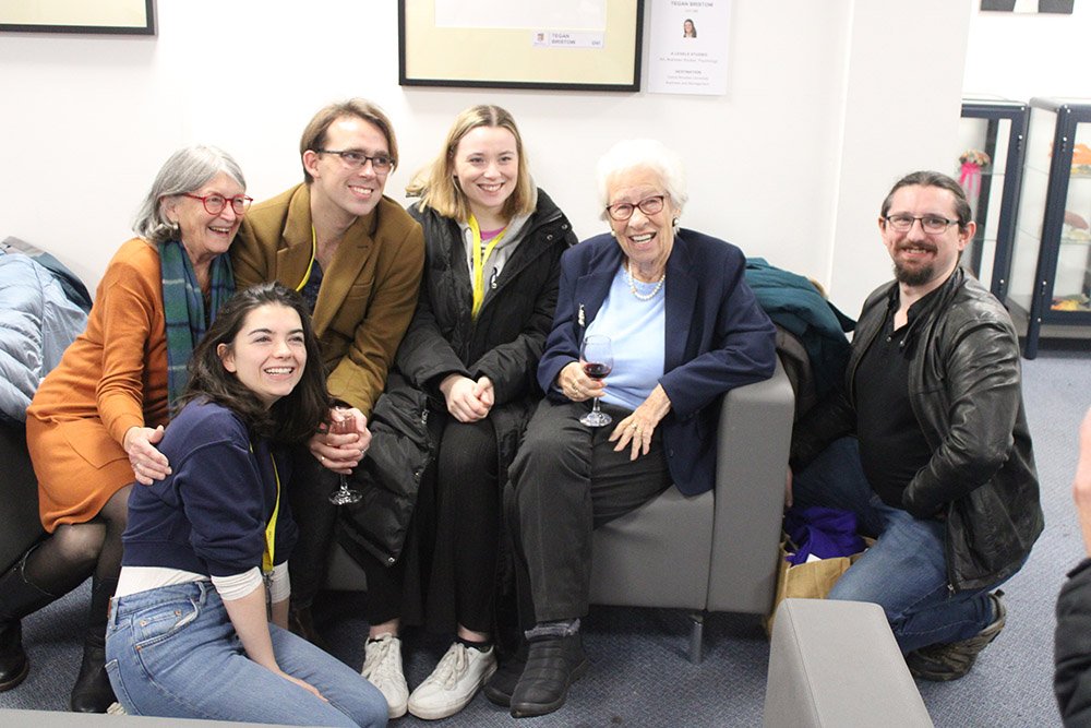 June Trask and Eva Schloss with the cast after a performance in November 2022