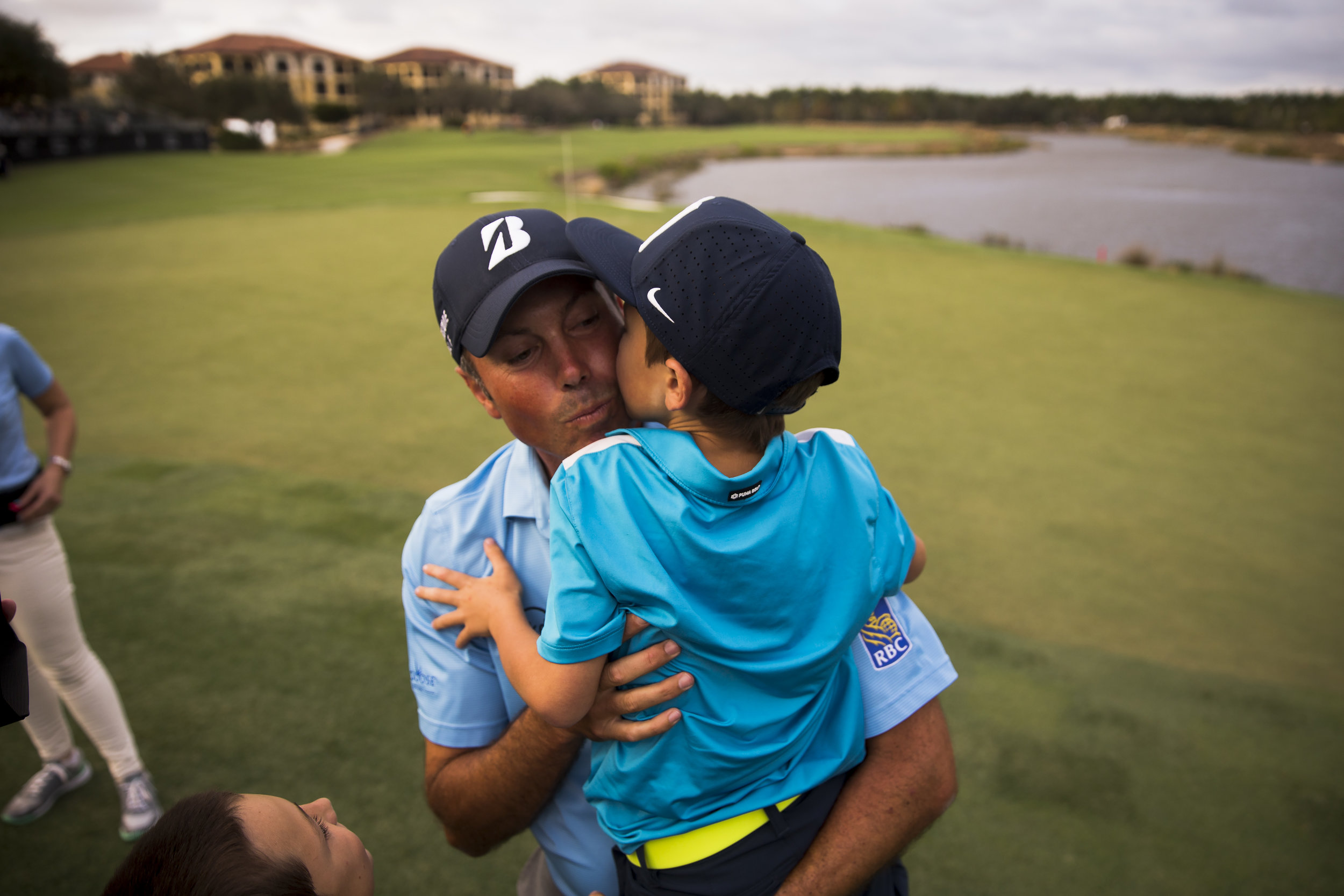  PGA Tour Pro Matt Kuchar receives a kiss from his son Carson Kuchar, 7, after winning the Franklin Templeton Shootout with teammate Harris English, not pictured,&nbsp;at Tiburón Golf Club at The Ritz-Carlton Golf Resort Saturday, Dec. 10, 2016 in Na