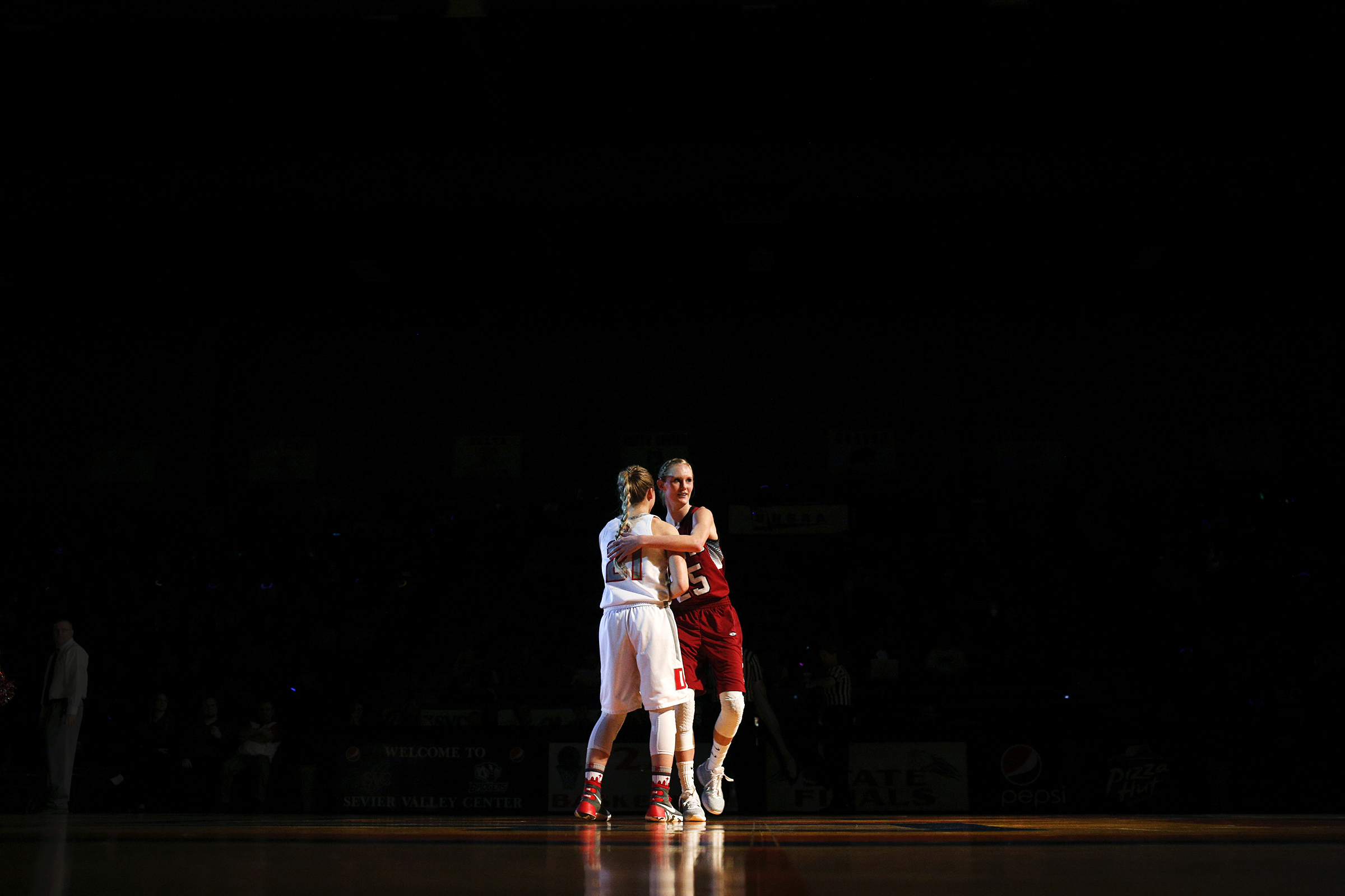  Delta's Harlee Willoughby, left, and North Sevier's Peyton Torgerson meet center court prior to the 2A Girls state basketball championship Saturday, Feb. 27, 2016 at the Sevier Valley Center in Richfield, Utah.&nbsp; 