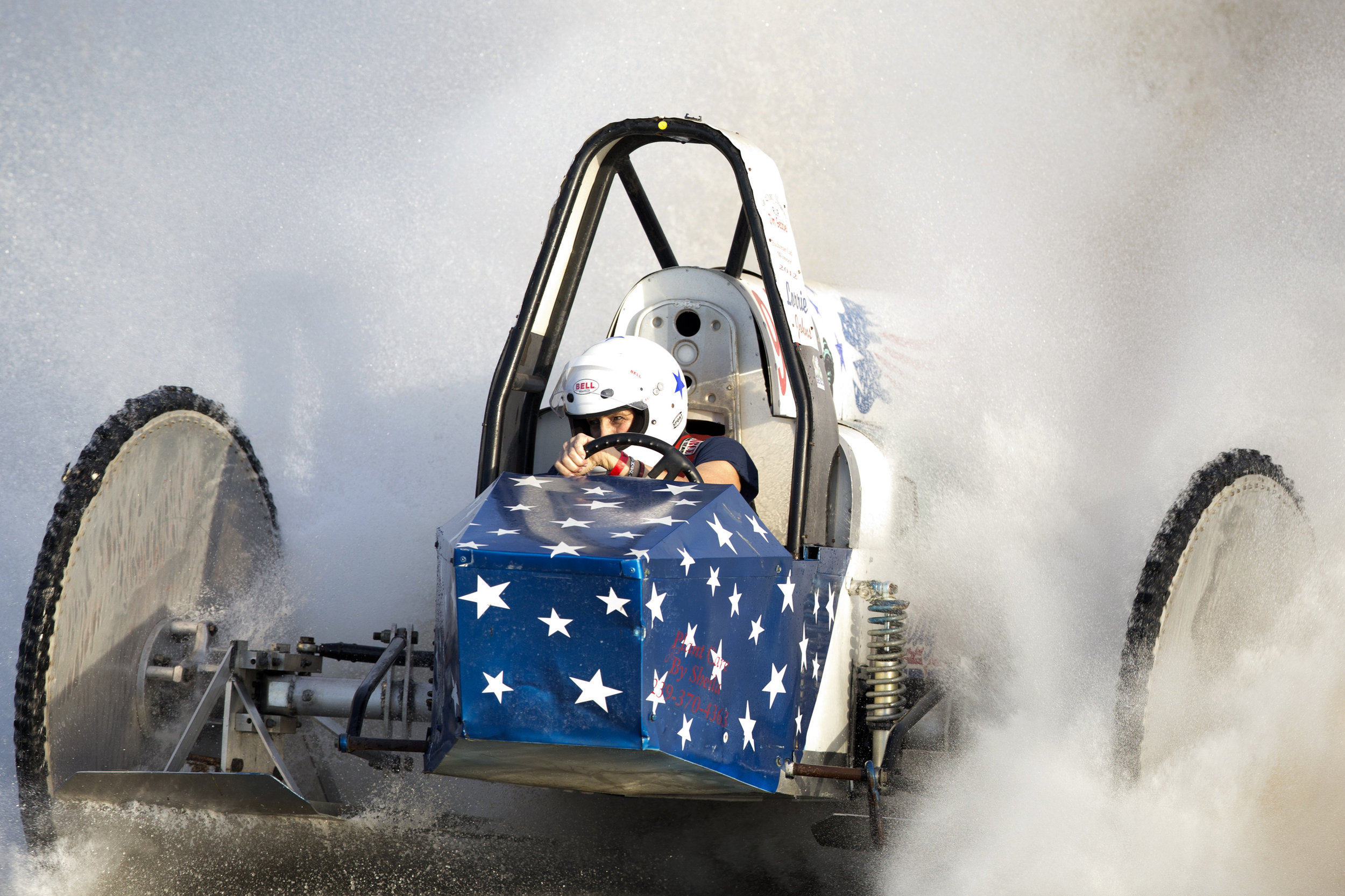 Driver Lorrie Johns races her swamp buggy "Lady Liberty" during the Budweiser Spring Classic at the Florida Sports Park Saturday, April 9, 2016 in East Naples.