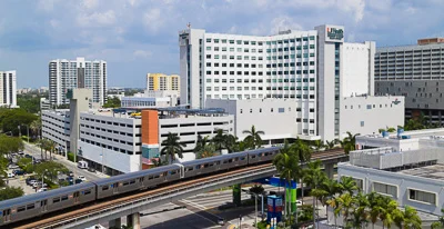 Program Overview: The University of Miami/Jackson Memorial Hospital Pulmonary and Critical Care Fellowship Training Program is accredited by the Association of Clinical Graduate Medical Education. The overall objective of our program is to prepare trainees for a wide spectrum of career opportunities, including academic teaching and patient care in respiratory and critical care medicine, biomedical research, and community-based specialty practice. The program generally offers two tracks: two years of Critical Care Medicine with a total of four positions or three years of Pulmonary/Critical Care Medicine with a total of twenty two positions. Applicants may apply only for one of the tracks, not for both. We offer for selected trainees interested in careers as physician-scientists a special curriculum with 12 months of dedicated research time and the possibility to enhance their training in research by completing a certificate in clinical research at the University of Miami translational research institute. The two year program makes trainees eligible for certification by the American Board of Internal Medicine in Critical Care whereas the three-year program makes trainees eligible for certification by the American Board of Internal Medicine in Pulmonary Diseases and Critical Care. The program is conducted at several facilities: Jackson Memorial Hospital (a county hospital), the Miami Veterans Affairs Hospital, the University of Miami Hospital, and The Sylvester Cancer Center. #1 Pulmonary/Critical Care Track: Pulmonary Consultation Services: The pulmonary consultation service (Jackson Memorial Hospital, Veterans Affairs Medical Center, and University of Miami Hospital) will develop the fellows’ skills to provide effective and proficient consultations based on scientific principles for patients with respiratory disorders to the requesting health care practitioner. Fellows will be exposed to a large spectrum of disease entities from commonly encountered to rare and unusual problems. This exposure will ultimately enable the fellows to effectively work as consultants in a variety of environments, such as private practice setting, as well as in a large hospital based practice, or in an academic center. The fellows will be exposed to and learn the technical aspects of pulmonary procedures such as bronchoscopies, transbronchial biopsies and other procedures. They are expected to appreciate a consultation as both a patient oriented diagnostic and management tool as well as an educational experience for themselves and the requesting health care practitioner. Pulmonary Medicine Continuity Clinic: Jackson Medical Center and VA Medical Center: The Pulmonary Medicine Continuity Clinic will develop and maintain the fellows’ skills necessary to provide effective continuity care for patients with pulmonary problems in the outpatient setting. Fellows will start to develop the skills necessary in the diagnosis and management of common ambulatory respiratory problems. They will be exposed to patients with more complex pulmonary problems and with proper supervision will learn how to address these problems. They will become aware of appropriate preventive health measures. They will develop skill to effectively serve as outpatient consultants and convey their findings and solutions of patients’ problems to the requesting physicians. They will collaborate with other health care professionals and coordinate their patients’ management with ancillary health care entities such as home health care, durable medical equipment suppliers, social services and community support services. Specialty Clinics Rotation: The Specialty Clinics Rotation gives the fellows the opportunity to work in clinics that are dedicated to the treatment of specific diseases. For the most part, these clinics manage unique patients with rare diseases. The clinics vary in their structure and function with some providing short-term consultation for referring physicians and others providing longitudinal care over longer periods. All bring together clinicians, basic scientists, nurses, case managers, research coordinators and other personal devoted to the understanding the pathogenesis, finding new treatments, and delivering the finest care to the patients under their wings. Fellows will be given a weekly schedule and rotate through specified clinics throughout the week. The clinics involve patients with cystic fibrosis, non-CF bronchiectasis, interstitial lung diseases, lung transplantation, Pulmonary Hypertension, Sarcodosis and sleep medicine. Pulmonary Procedures Rotation: The Interventional Pulmonology rotation provides education in all aspects of standard bronchoscopy and pleural disease. Trainees also gain exposure to advanced diagnostic and therapeutic bronchoscopic and pleural techniques. Tuberculosis Rotation: This is a combined effort between the University of Miami, Jackson Health System and Florida Department of Health. It is a rotation is a unique opportunity for pulmonary fellows to learn about difficult tuberculosis cases located at the Department of Health Tuberculosis Center, one of the few left in the entire country. In the afternoons, fellows are expected to learn and read about pulmonary function test and cardio-pulmonary exercise testing. Critical Care Rotation: The critical care rotation is designed to provide fellows with a well rounded education in the management of critically ill patients. While focused on medical patients, trainees completing the program will have sufficient experience to competently provide critical care for surgical and trauma patients as well. A modern intensive care unit does not exist in isolation, but functions as anintegral part of the hospital setting, coexisting and coordinating with other services, including medical, ancillary, quality management, and administrative. Fellows will be trained in the necessary skill sufficient to permit competent administration of an intensive care unit. Clinical training in critical care medicine takes place at all three teaching hospitals, Jackson Memorial Hospital, Veterans Affairs Medical Center and the University Of Miami Hospital. Fellows will spend a minimum of nine months and not more than fifteen months in a critical care unit. The program incorporates three months of training in a non-medical intensive care unit, i.e. Surgical Intensive Care Unit, Trauma Intensive Care Unit, Neurosurgical Intensive Care Unit, or Chest Surgical (Transplant) Intensive Care Unit. Fellows will gain an understanding of the pathophysiology of a broad range of critical illnesses including respiratory failure of various causes, sepsis and septic shock, hemorrhage and hemorrhagic shock, renal failure, hepatic failure, status epileptics, acute stroke, acute cardiac events including myocardial infarction and cardiogenic shock and many other conditions. Fellows will learn and master therapeutic techniques including invasive and noninvasive ventilatory support, resuscitation, invasive monitoring and bedside diagnostic techniques, intubation, pacemaker insertion, tube thoracostomy, use of vasoactive agents conscious sedation and therapeutic sedation, and nutrition support in the critically ill. These rotations are also designed to instruct the fellows in aspects of intensive care unit administration. Fellows will be intimately involved in evaluating patients for appropriateness of intensive care. They will become familiar with anticipated staff loads based on patient acuity, thus learning how to utilize an intermediate care setting. Fellows will participate in quality management activities of the intensive care unit under the direct supervision of the attending. They will become familiar with the intricacies of explaining critical illness to families of patient, with associated issues such as advance directives. Autopsy and morbidity/mortality conferences will be attended when relevant. Pulmonary and Critical Care Medicine Reading List Visit the American Thoracic Society website for the current ATS Reading List . This list is reviewed by the ATS Training Committee and updated annually. Research: As part of the academic environment a research component is included in the three year pulmonary/critical care fellowship program. The division is engaged in many grant supported basic science and clinical research projects. All fellows are expected to participate in one or more of these projects. During their first year of training fellows will have an opportunity to obtain information about ongoing research through formal divisional research conferences, discussion with the program director and with individual faculty. After eight months of their first year of fellowship (in March of the following year after beginning of their fellowship in July) fellows will submit a research protocol signed by their tutors/mentor to the Research Committee. This committee will evaluate the merits of the protocol and determine whether the research will be conducted concomitantly with other assignments or whether a block of dedicated research months will be given to the fellow. Fellows will be assigned according to their preference to a faculty member as tutor/mentor, who will closely supervise the fellow to assure a productive learning experience. Fellows are expected to present their research results at national meetings and achieve publication of their work in peer reviewed journals. Fellows will learn about study design and critical interpretation of research data. #2 Critical Care Track: The University of Miami/Jackson Memorial Hospital Critical Care Fellowship Training Program offers 4 approved positions. The program is accredited by the Association of Clinical Graduate Medical Education. The overall objective of our program is to prepare trainees for a wide spectrum of career opportunities, including academic teaching and patient care in critical care medicine, biomedical research, and community-based specialty practice. Typically, trainees spend two year in the program, consisting of rotations in a variety of critical care and related settings: specialized medical, general surgical, cariothoracic, neuroscience, trauma and bone marrow transplant intensive care units; pulmonary and anesthesia rotations; and clinical research. This two-year program makes trainees eligible for certification by the American Board of Internal Medicine in Critical Care Medicine. The mix of hospitals and variety of intensive settings provides a rich training environment spanning the gamut of modern intensive care. Fellow responsibilities vary by rotation, an include mentoring of junior trainees, as well as increasing clinical responsibility with progression through fellowship. The Critical Care Medicine fellowship operates in close coordination with the Pulmonary/Critical Care fellowship and uses the same facilities (JMH, VAMC, UMH, UMHC). There are shared divisional Grand Rounds, journal clubs, imaging training, as well as many other conferences and learning activities. Enrolles in the Critical Care Medicine fellowship typically spend somewhat more time in training devoted to specifically to critical care than do trainees in the dual track program. An abbreviated one year program may be available for graduates of other Internal Medicine subspecialty fellowships.