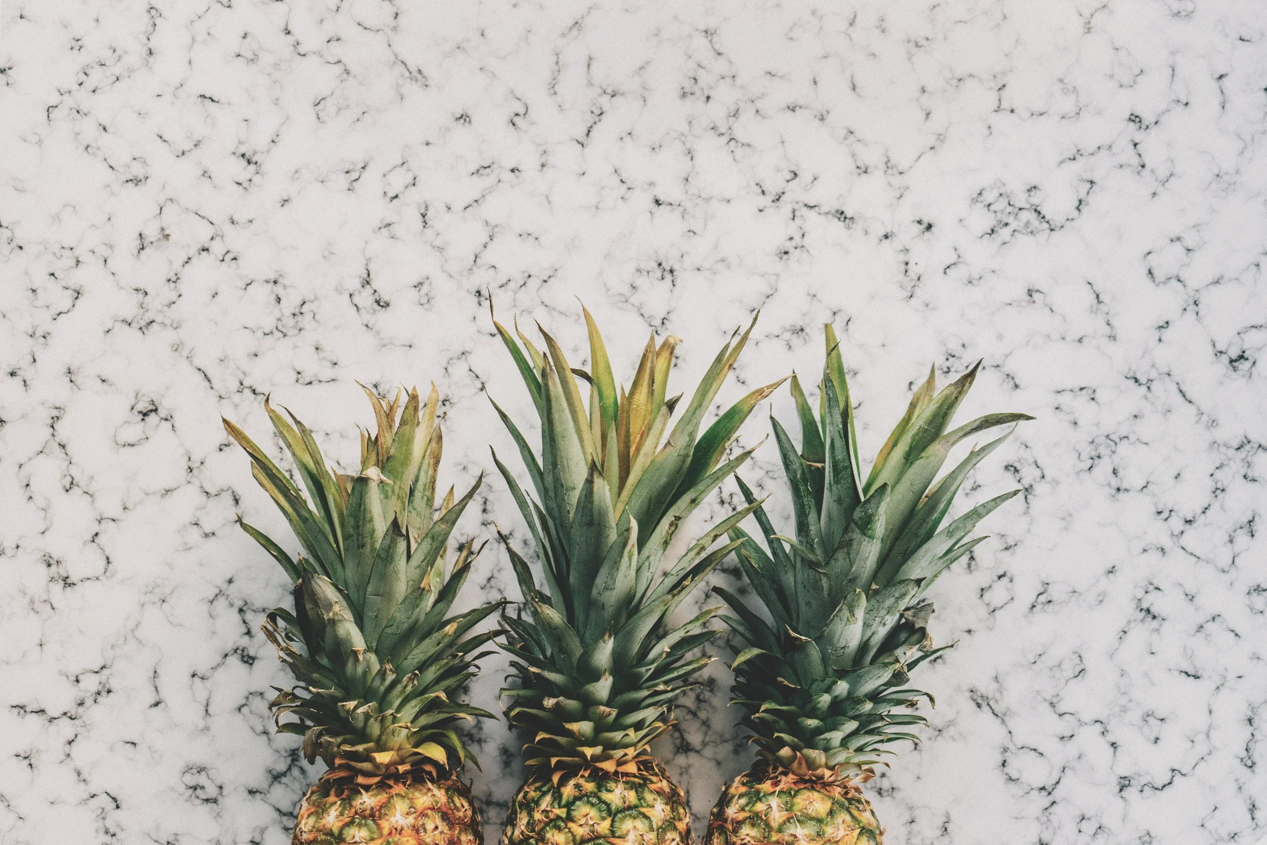 pineapples on marble .jpg