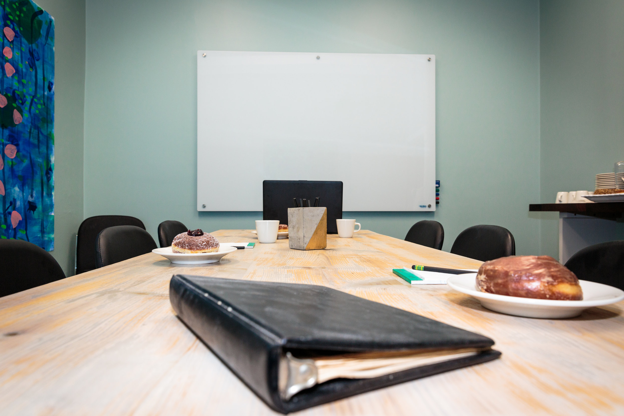 The perfect spot for your next meeting comes with a spread of donuts and coffee