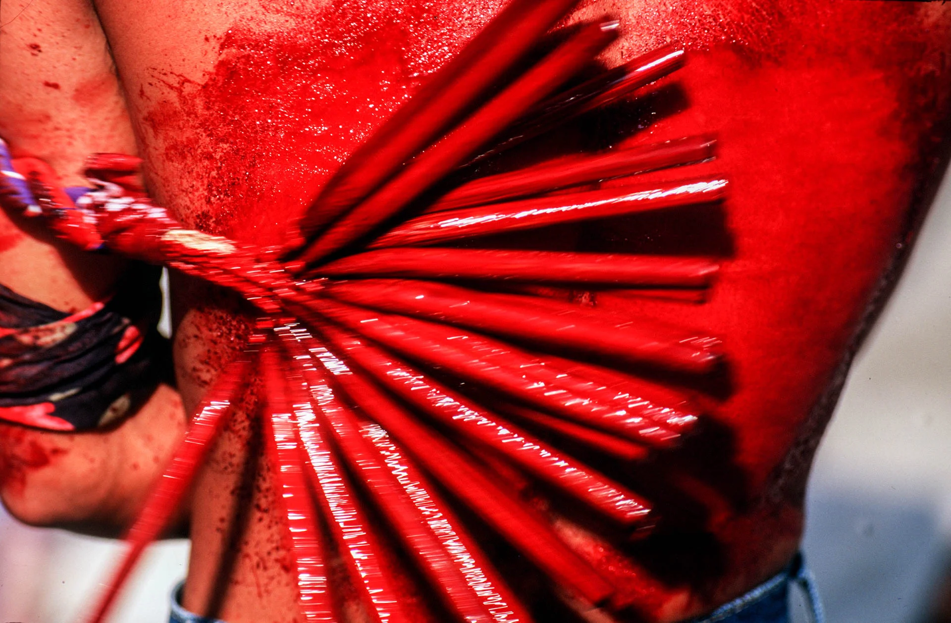 The miracle around the world: Philippines, Holy Friday in San Fernando, flagellation of a penitent.
