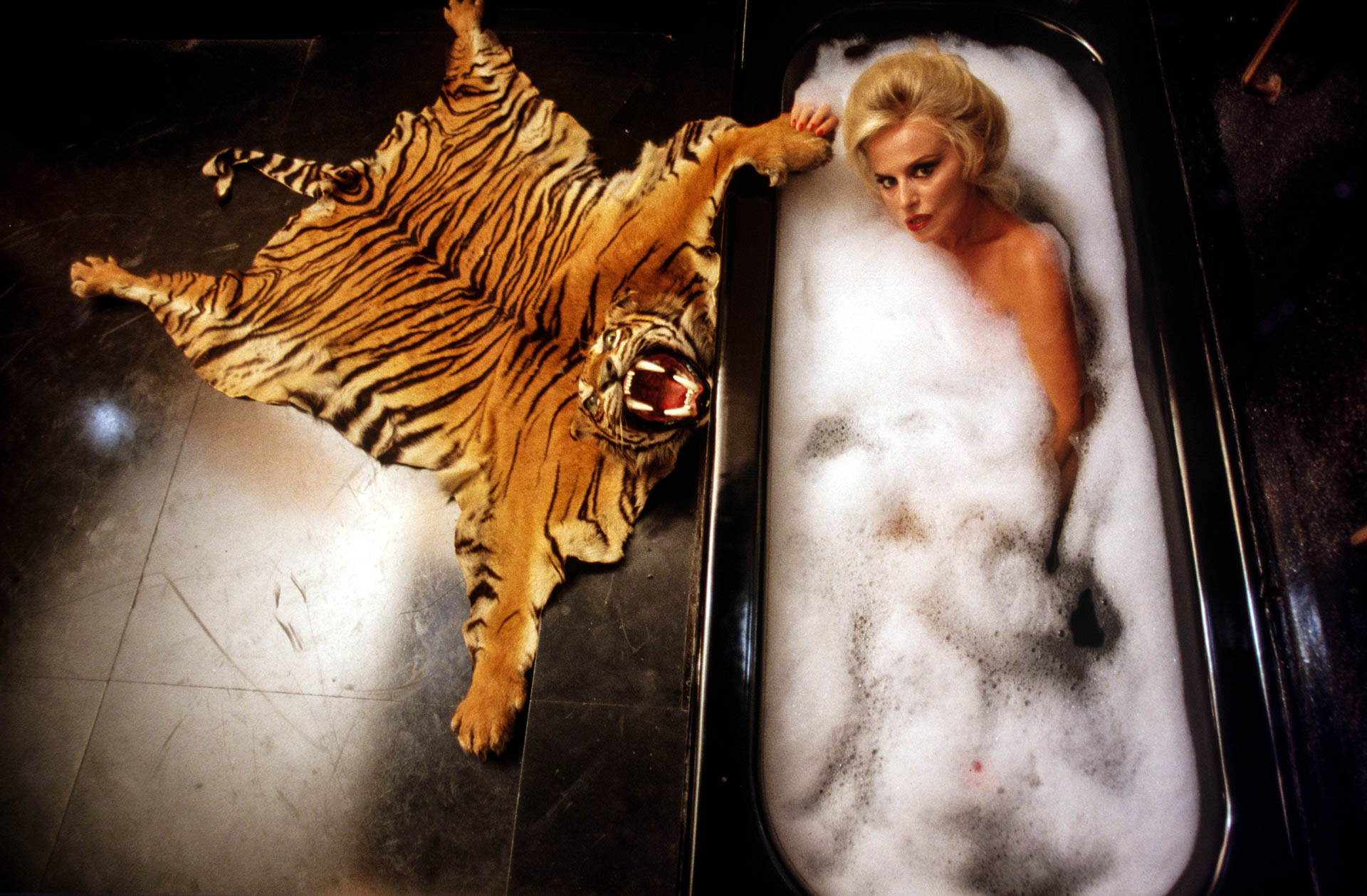  Rome, Italy - October 1987 
Countess Donatella Pecci Blunt taking a bath in the bathroom of her private apartments, on the top floor of Palazzo Pecci.
© GIANNI GIANSANTI 
