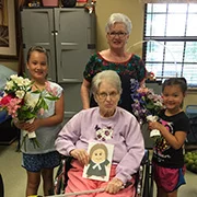 Lynda Martinez, her granddaughters and Flat Wesley went to Silver Tree to deliver flowers to the residences.