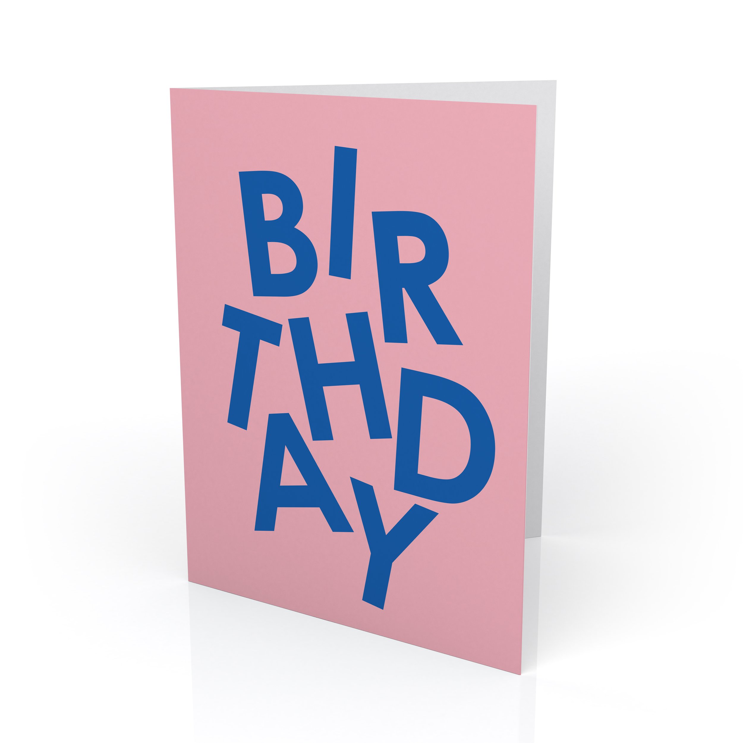 A pink greetings card with modern typography in blue spelling out the word BIRTHDAY