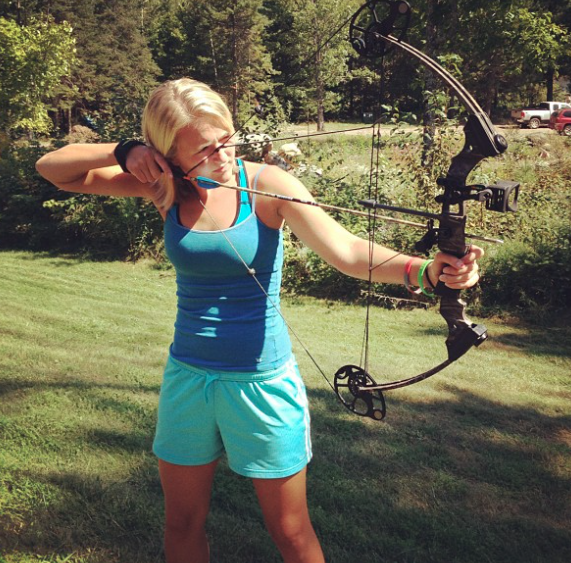 2012: My first year shooting my Mission Menace. My head is tilted forward in poor form, my arm is bent too much, and my grip on the bow is too tight. 