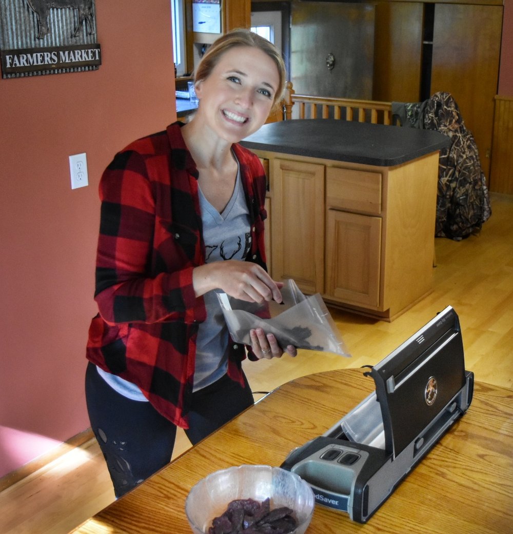 Ali packaging her jerky