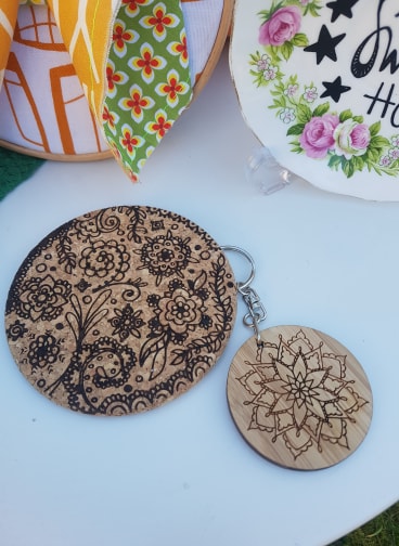 Laser cut coasters and keyrings in a variety of styles by Bec Ashford, from £4.99