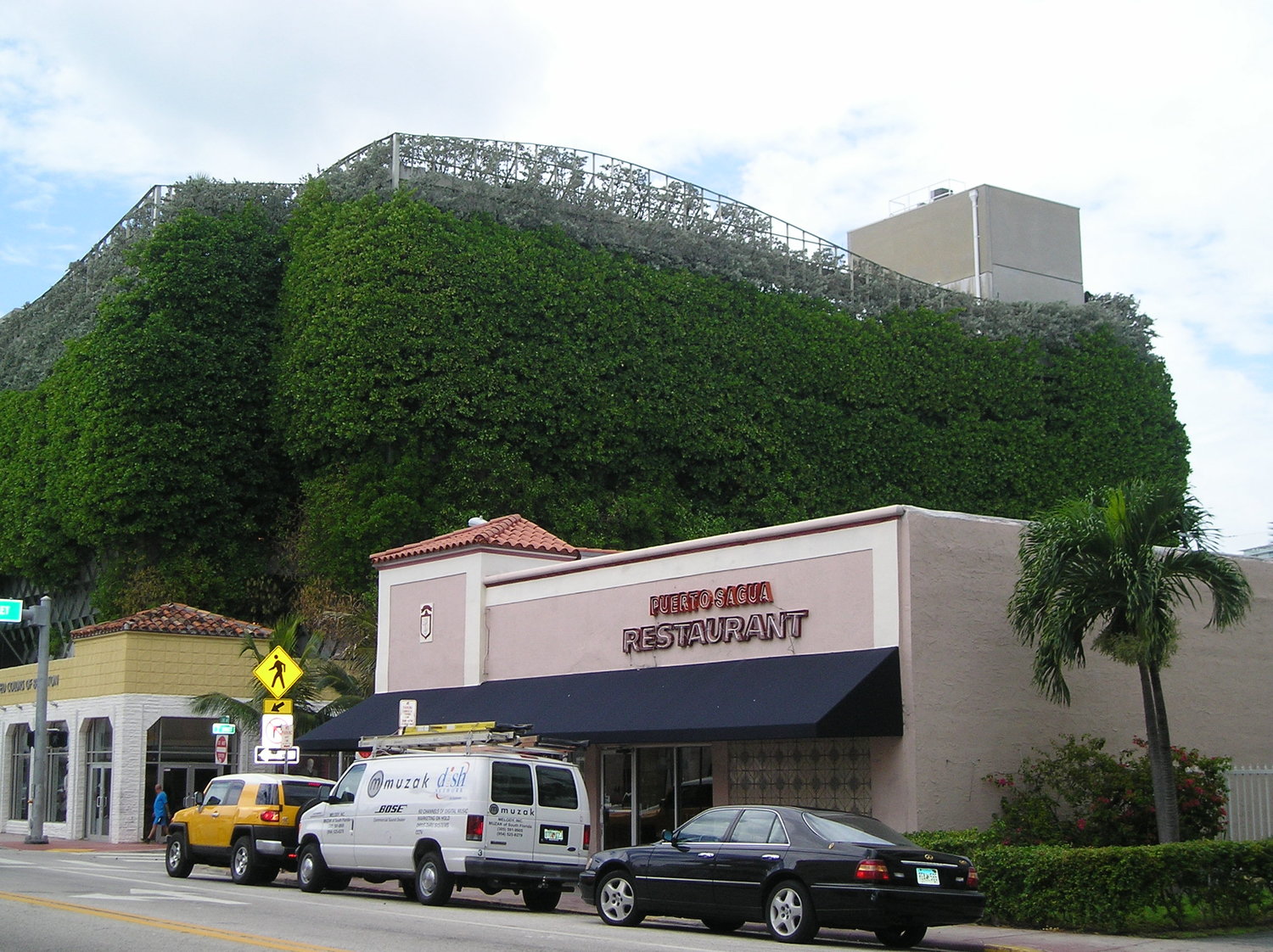 Miami Beach Florida,Collins Avenue,parking garage,Seventh 7th Street Parking  Garage,multi use building,shops,vertical vegetated wall,urban landscape,p  Stock Photo - Alamy