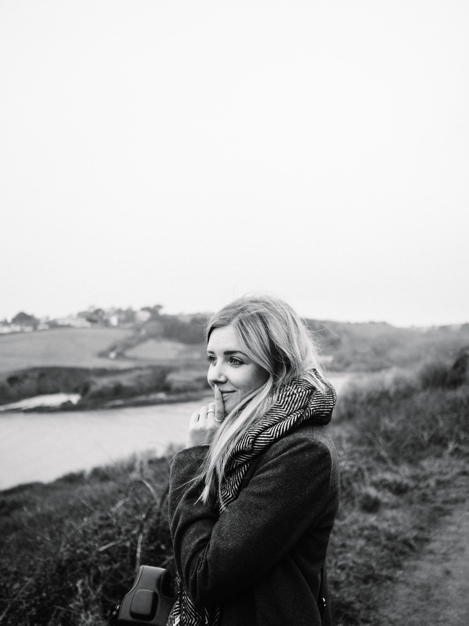  Here is Anna, once again, only this time, this image has been used for her web design business,  ByRosanna . The branding for ByRosanna is very different to that of The Cornish Life - it's much darker, more modern and slightly moody. These headshots of Anna were taken on a walk during Winter. By converting the images into black and white, the vibe was taken from being a bit too 
