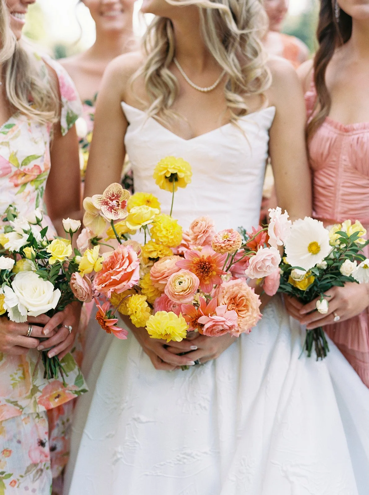 Bridal party holding bouquets