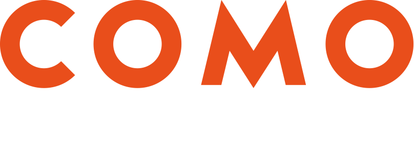 The word 'COMO' in large orange letters, with 'WINE & SPIRITS' in smaller white text below.