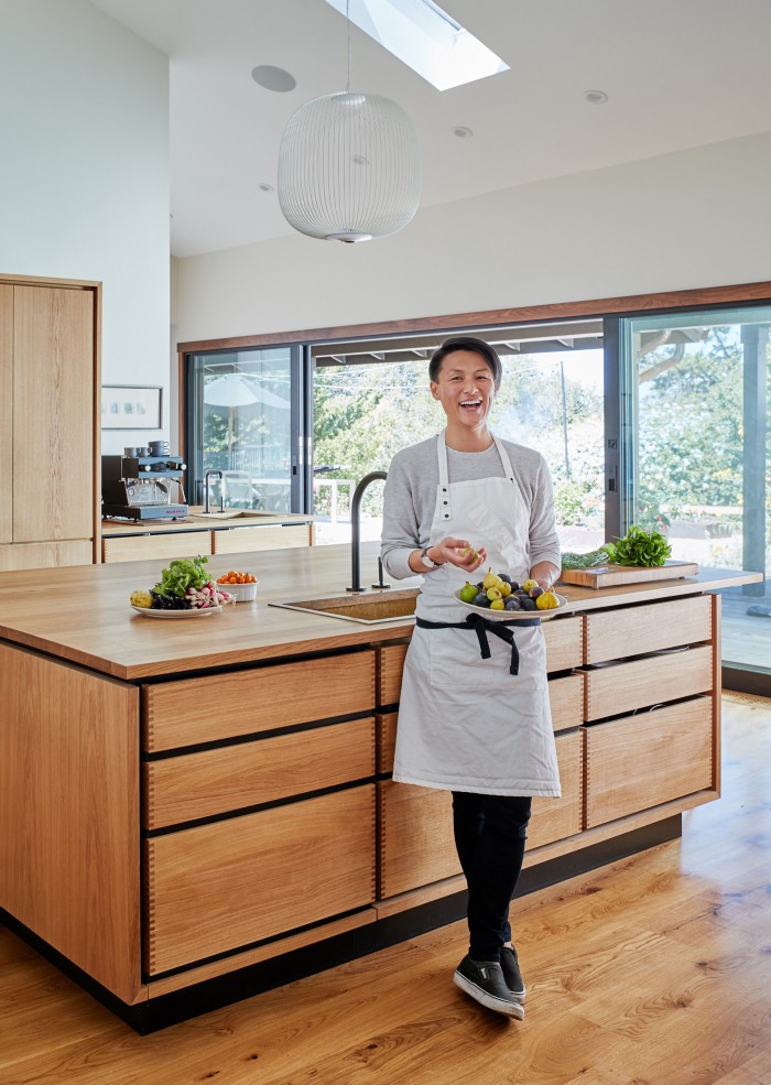 Chef Melissa King test-drives the new kitchen (cabinets, Garde Hvalsoe; photo credit: James Carriere, courtesy of Staprans Design).