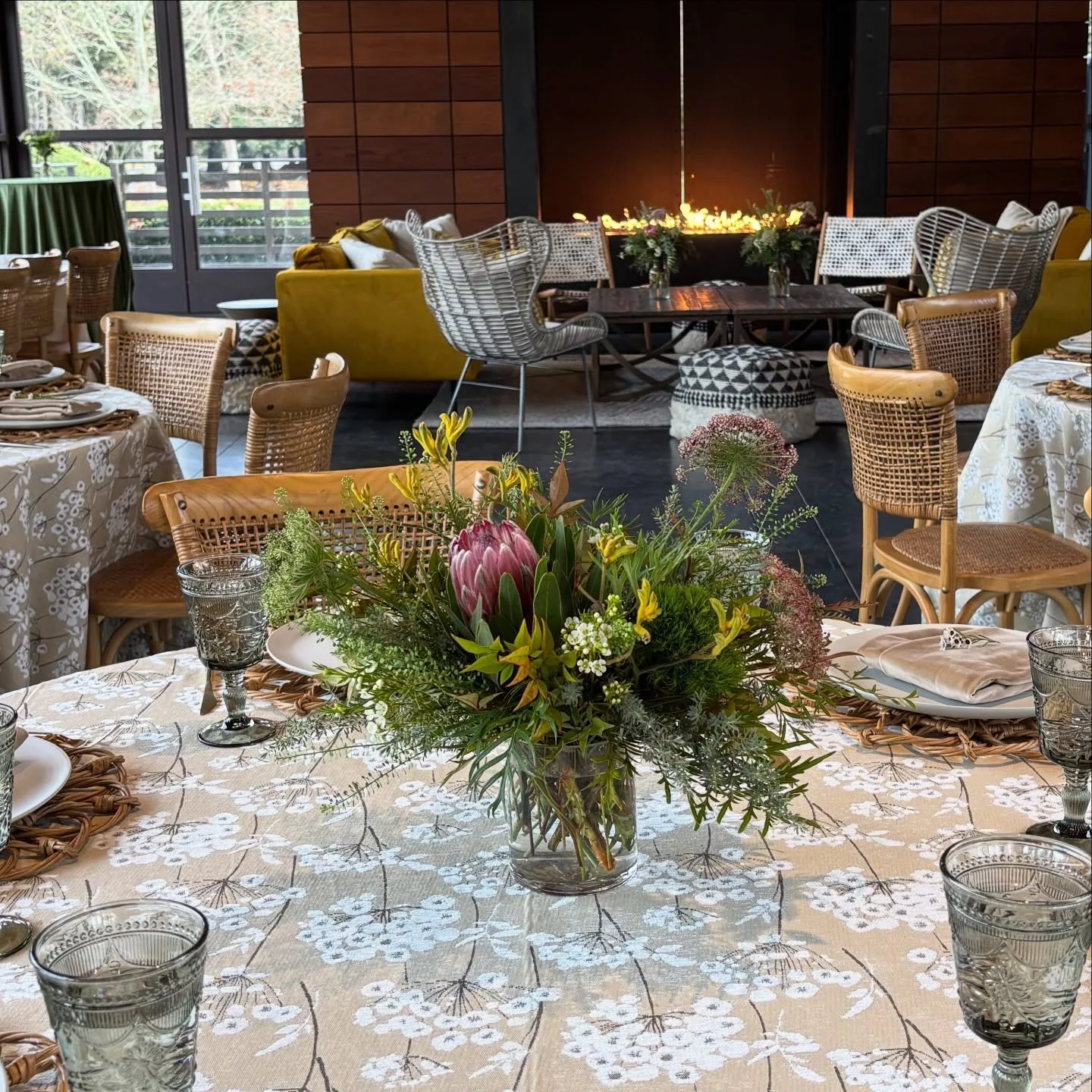 A linen of patten really turns it up. It accentuates the room, contributes to the theme, and makes a table pop. DON&rsquo;T BE AFRAID of PATTERN! Layer with textured napkins, a neutral centerpiece, and elegant flatware. 

I talk about pattern in my e
