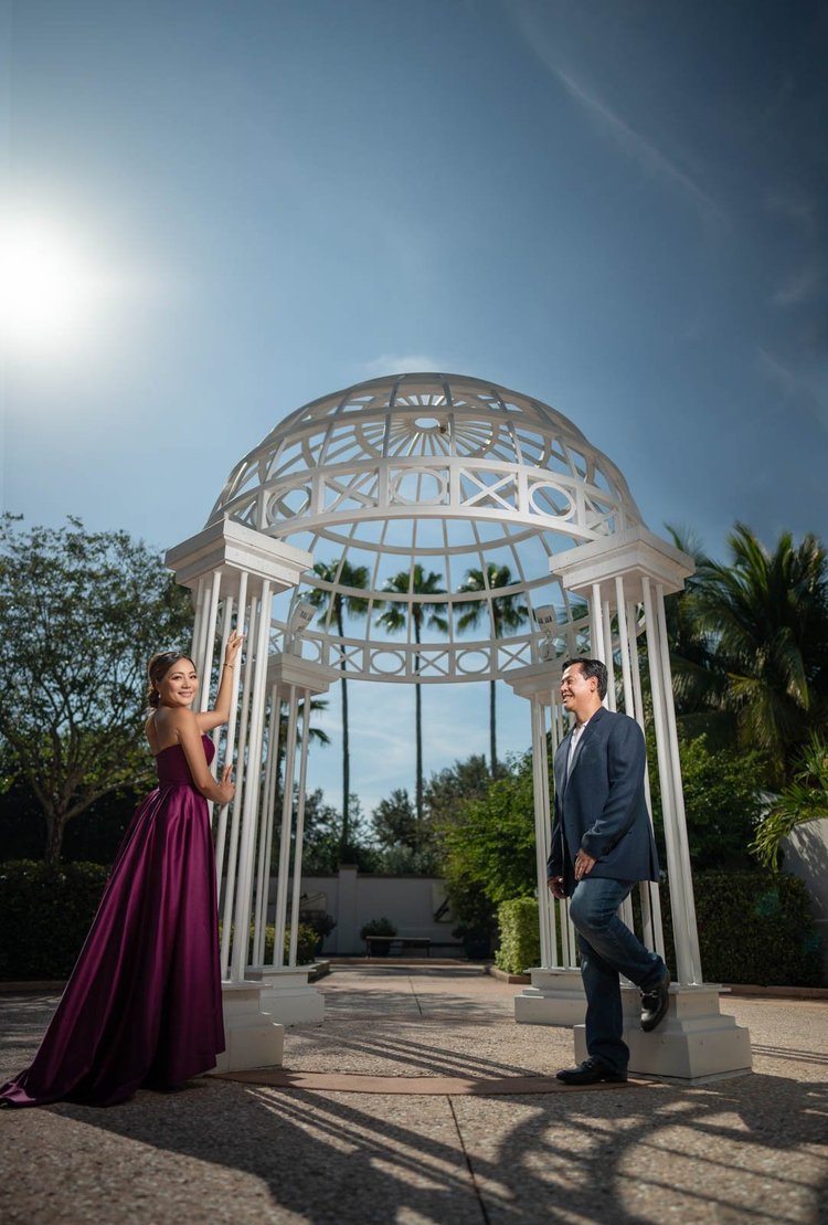 Engagement photos at a garden gazebo, by Henry M Production