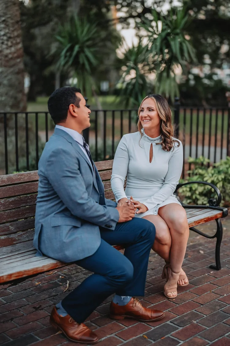Engagement photos on a park bench, by Henry M Production