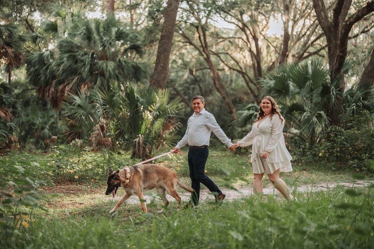 Engagement photos in the park with their dog, by Henry M Production
