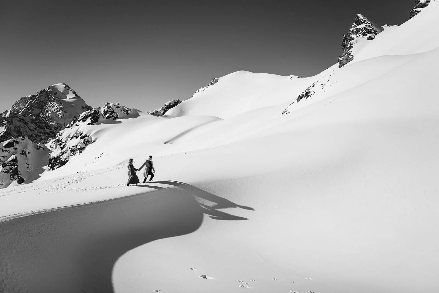 Alex &amp; Victoria, immersing in the fresh powder and freshly engaged only minutes before this frame. 💍

.
.
#proposal #engaged #nzphotographer #engagement #heliproposal #nikon #newzealand #fearlessphotographer #lookslikefilm #socality #wanderfolk #visualscollective #visualsoflife #welltravelled #liveauthentic #makemoments #lifeofadventure #stayandwander #theoutbound  #thewandererscommunity #togetherjournal #simplyadventure #mtcook #fortheloveofmountains #heyheyhellomay #madewithmastin #photobugcommunity #junebugweddings #andybrownphotography