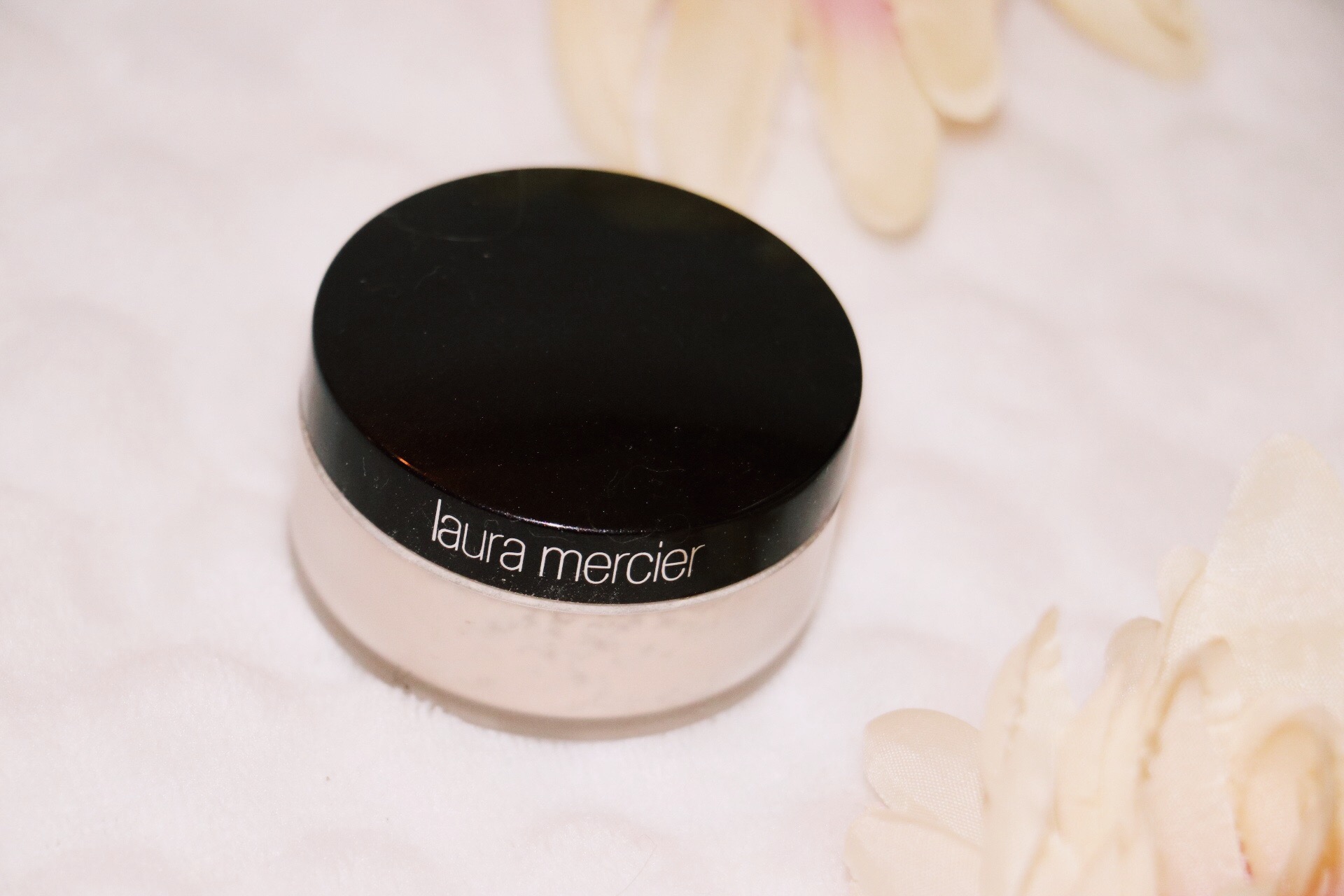 4) Laura Mercier - Translucent Loose Setting Powder If you know me, then you know I watch countless makeup tutorials on youtube daily. This is definitely a product that is used and recommended by so many people! I finally got it for christmas and love it. I have dark circles under my eyes (born with them; runs in the fam yay!) and this does a pretty great job in neutralizing the tones under my eyes! This product just locks everything in to place, which is great! You can purchase it here .