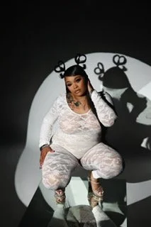 whiteinchair.JPG