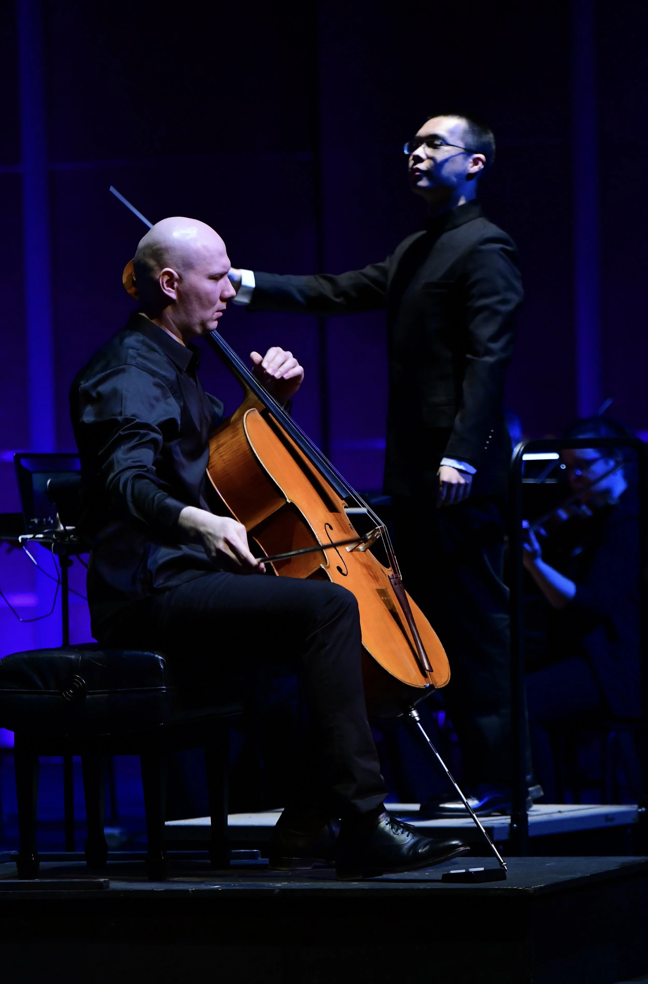 3/2024: conducting "cetacean songs" with cellist Eduard Teregulov and the Fox Valley Symphony