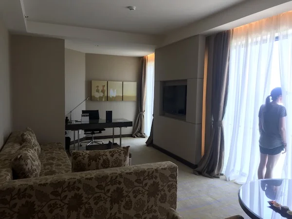 We paid $55 + 7,000 Starpoints nightly and got upgrade to an executive suite with this ocean-view living room at the Sheraton Nha Trang.