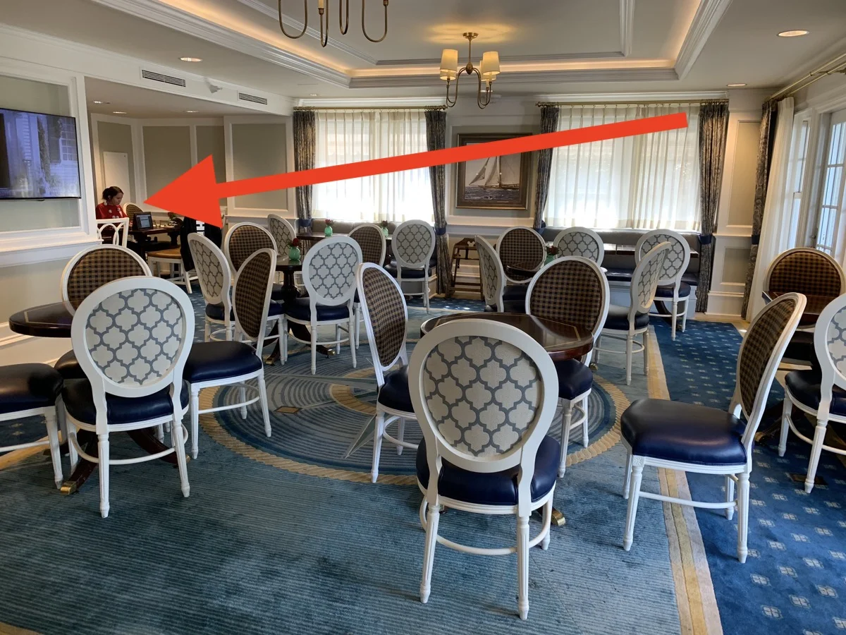 Only one sad lady working in the lounge instead of enjoying her $5000 vacation.