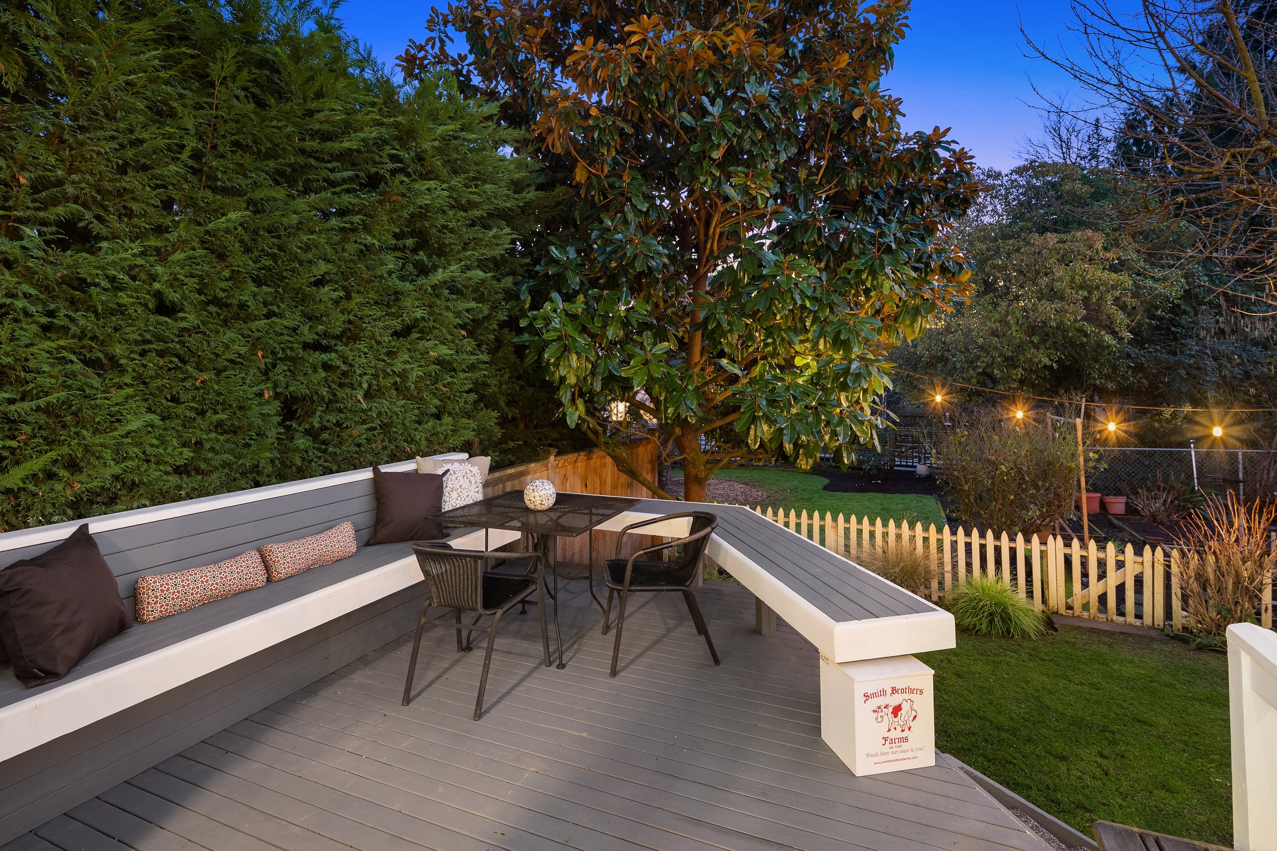  Deck off the kitchen ensures indoor|outdoor living comes full circle, offering inviting spaces for dining al fresco. 