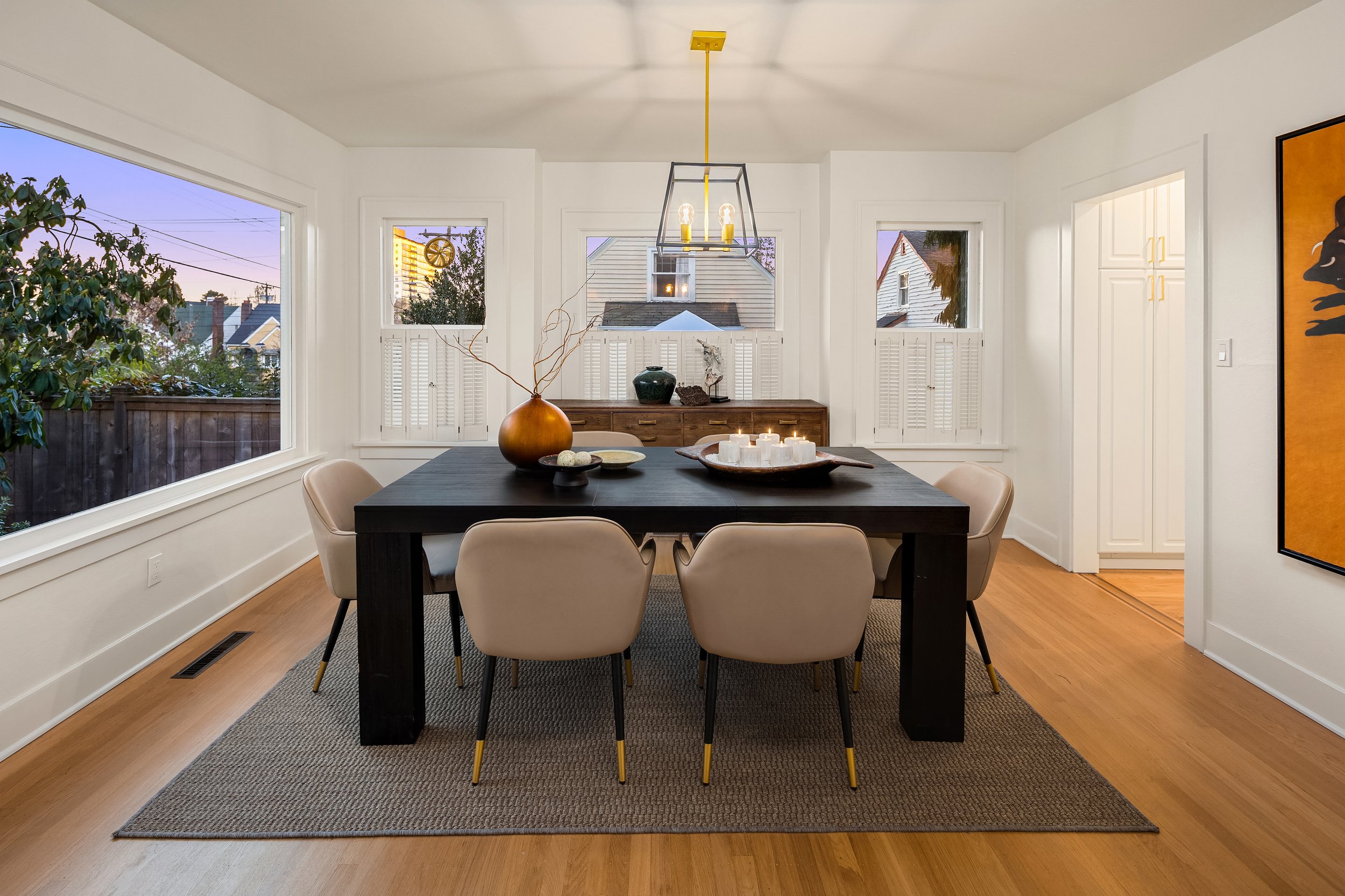  Opposite the living room, this true dining room offers plenty of room for guests, and easy access to the kitchen. 