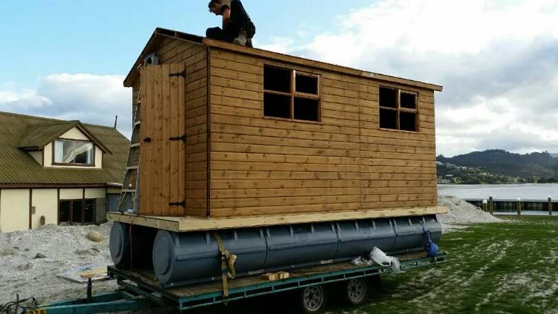 Floating work shed at a marina